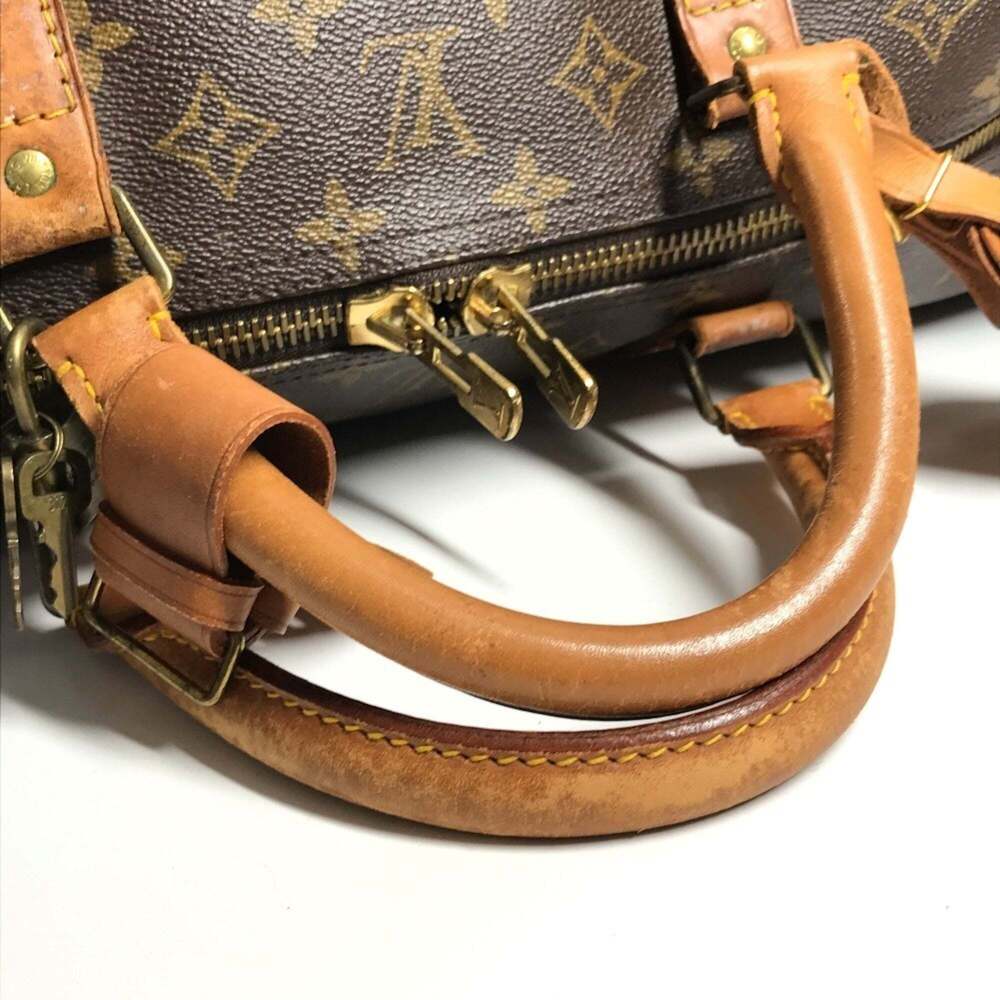 LOUIS VUITTON Brown Monogram Canvas Keepall 60 Boston Bag - Picture 11 of 16